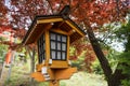 Shinto lanterns and autumn leaves at torii gate of Chureito pagoda Royalty Free Stock Photo