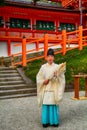 Shinto priest in Kasuga Taisha shrine, Nara, Japan Royalty Free Stock Photo