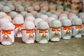 Shinto small monk figurines at shrine in Kyoto, Japan