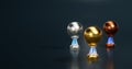 Shiny Basketball Gold Silver and Bronze Trophies with a Dark background Royalty Free Stock Photo
