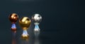 Shiny Basketball Gold Silver and Bronze Trophies Focused on Gold with a Dark background Royalty Free Stock Photo