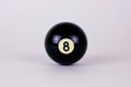 Shiny black ball number 8 for billiard isolated on white background Royalty Free Stock Photo