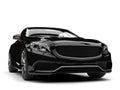 Shiny black modern luxury convertible car - front view closeup shot Royalty Free Stock Photo