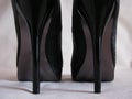 Shiny black stilleto heels