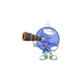 Shiny blue christmas ball cartoon with character sailor holding binocular