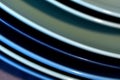 Shiny blue plates edges macro. Abstract curved lines.