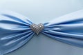 Shiny blue satin ribbon and diamond heart . Royalty Free Stock Photo