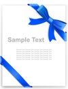 Shiny blue satin ribbon on white background