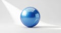 Shiny blue sphere on white surface Royalty Free Stock Photo
