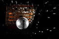 Shiny bright highlight, disco, silver white ball, on the ceiling of a nightclub, atmosphere, interior, nightlife
