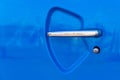 Shiny chrome handle on a blue car door Royalty Free Stock Photo