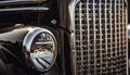 Shiny chrome vintage car grille, elegance in motion generated by AI