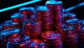 Shiny Coins Stacked on a Neon Surface With a Blue Glow Highlighting Cryptocurrencies at Night Royalty Free Stock Photo