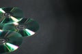 Shiny compact discs on black background. Space for text Royalty Free Stock Photo
