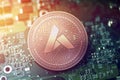 Shiny copper ARDOR cryptocurrency coin on blurry motherboard background