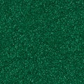 Shiny dark green glitter, sparkle confetti texture. Christmas abstract background, seamless pattern. Royalty Free Stock Photo