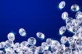 Shiny diamonds on a blue background Royalty Free Stock Photo