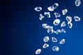 Shiny diamonds on a blue background Royalty Free Stock Photo