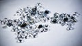 Shiny diamonds stones laying on white table Royalty Free Stock Photo
