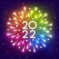 Shiny fireworks on rainbow starry sky background for 2022 New Year design