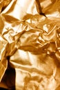 Shiny Foil Crumpled in Sharp Crumpled Metallic Gloss Background Gold