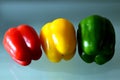 Shiny fresh red yellow and green bell peppers in closeup view Royalty Free Stock Photo