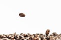 Shiny freshly roasted coffee beans on a white background. Isolated Royalty Free Stock Photo