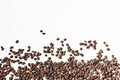 Shiny freshly roasted coffee beans on a white background. Isolated Royalty Free Stock Photo