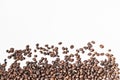 Shiny freshly roasted coffee beans on a white background. Isolated Royalty Free Stock Photo