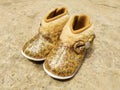 Shiny, furry, golden baby girls shoes