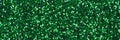 Shiny glitter texture in green tone, adorable Christmas background. Royalty Free Stock Photo