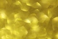 Shiny gold abstract background with a bokeh effect Royalty Free Stock Photo