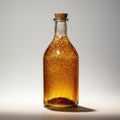 Shiny Gold And Amber Bottle On Bright Surface Royalty Free Stock Photo