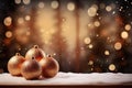 shiny gold Christmas ball bouncing in front of blurred Christmas candle light and unfocused bokeh Royalty Free Stock Photo