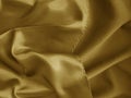 Shiny gold crumpled fabric combinated with matte one