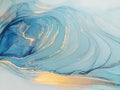 Luxury abstract fluid art painting background alcohol ink technique blue and gold. Swirls of shiny gold edges. Royalty Free Stock Photo