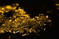 Shiny gold strips on dark background Royalty Free Stock Photo
