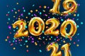 Shiny golden balloons numbers 2019 2020 2021. new year. change of years. background of multicolored sequin. candy Vector Royalty Free Stock Photo