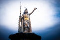 Shiny golden statue of Pachacuti on the pedestal in Cusco Royalty Free Stock Photo