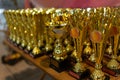 Golden trophy cups, sports competition, winner award ceremony Royalty Free Stock Photo
