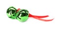 Shiny green sleigh bells with ribbon isolated on white