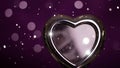 Shiny Heart-Shaped Object on Dark Background Royalty Free Stock Photo