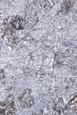 Shiny heavily wrinkled metal silver gray foil vertical texture background Royalty Free Stock Photo