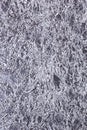 Shiny heavily wrinkled metal silver gray foil vertical texture background Royalty Free Stock Photo