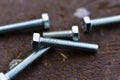 Shiny iron bolts for mounting on rusty surfaces