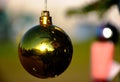 Decorative golden glass christmas ornament ball with soft background Royalty Free Stock Photo