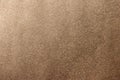 Pale shiny bronze foil texture background. Brown copper texture background