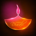 Shiny lit lamp for Happy Diwali celebration. Royalty Free Stock Photo