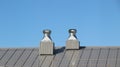 Shiny metal air ventilation on roof rotates to clean air in building and regulate temperature