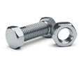 Close up view of a hexagonal bolt and matching nut on a white background Royalty Free Stock Photo